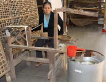 Unwinding Cocoons To Make Silk Thread