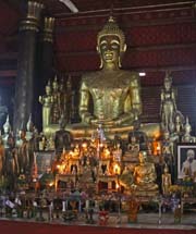 Gilded Buddha inside Wat Mai Suwannaphumahama